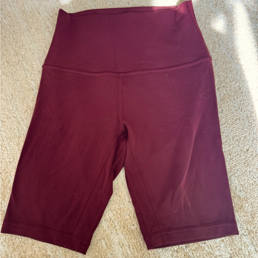 Lululemon 8 inch shorts 
Size 2 
Berry color